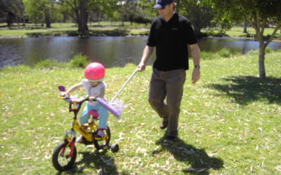 Why Every Toddler Bike Ride Needs a Push Handle: A Parent’s Guide